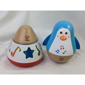 Hape Baby Toy Musical Windup Rotating Music Box Penguin Chime Ball